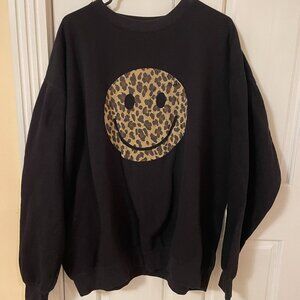 Distressed Cheetah Smiley Face Sweater